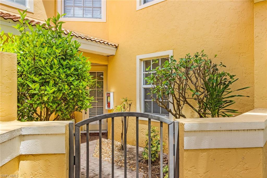 20240 Burnside Place, Unit 1603 Estero, FL 33928 - Photo 4 of 41 a view of a building from a window