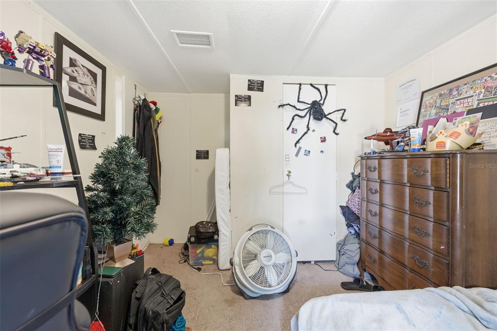 13050 Sun Road Brooksville, FL 34613 - Photo 24 of 47 a view of a livingroom with furniture and toys