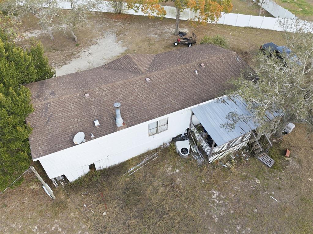 13050 Sun Road Brooksville, FL 34613 - Photo 26 of 47 an aerial view of a house with a outdoor space