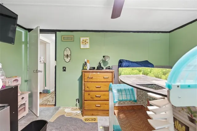 a bedroom with a bed and furniture