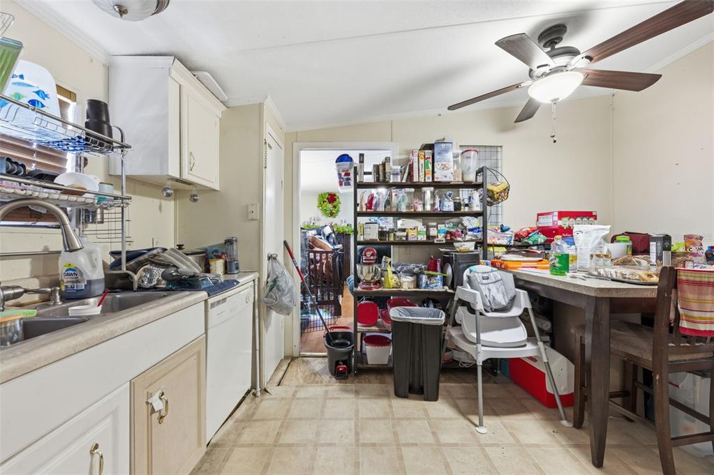 13050 Sun Road Brooksville, FL 34613 - Photo 8 of 47 a view of a storage & utility room