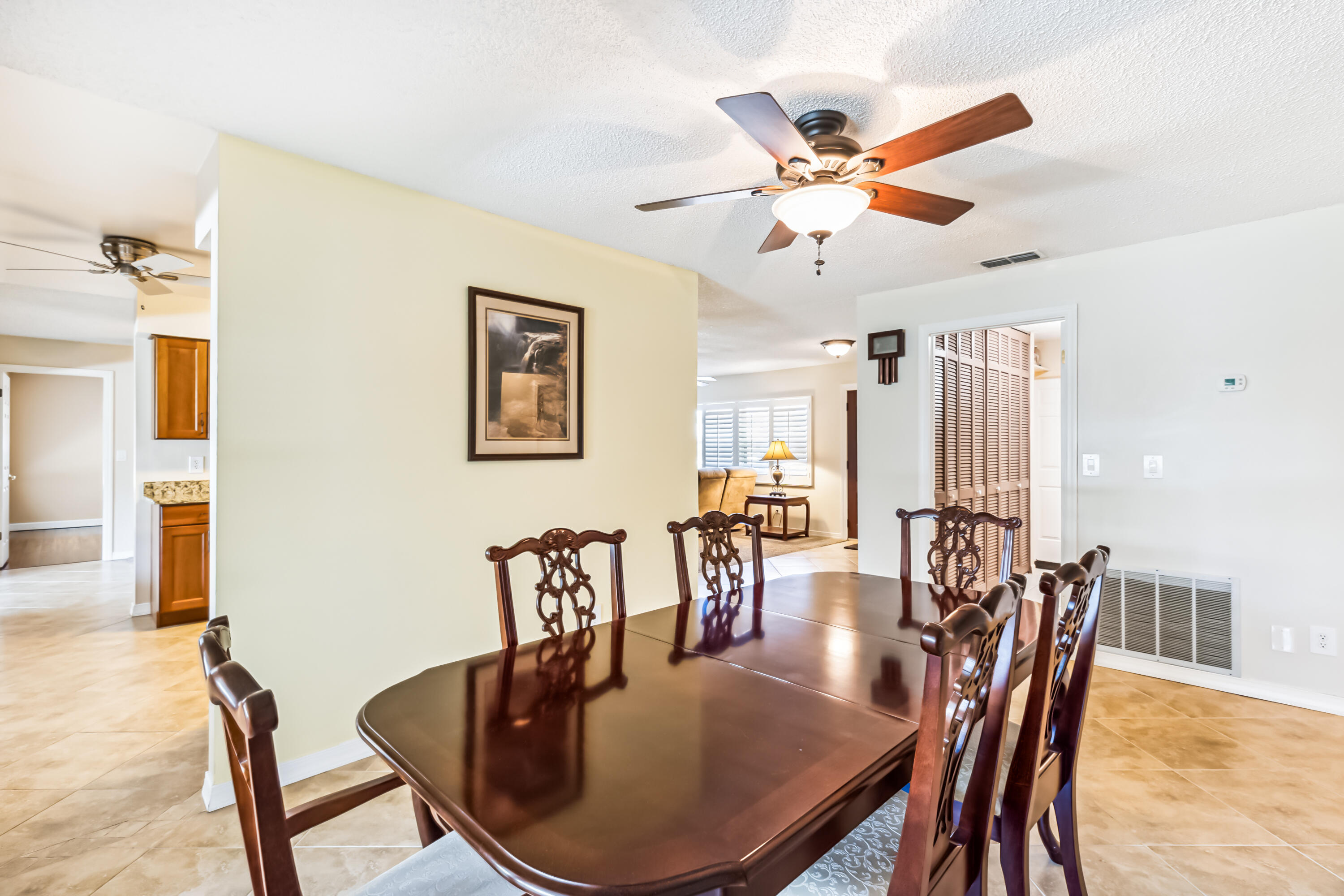 1851 Tallpine Road Melbourne, FL 32935 - Photo 10 of 35 Dining space loooking toward the kitchen