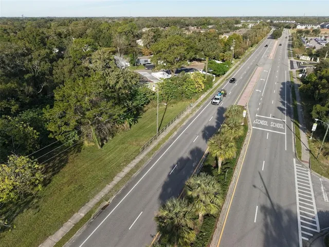 a view of a yard with a bench