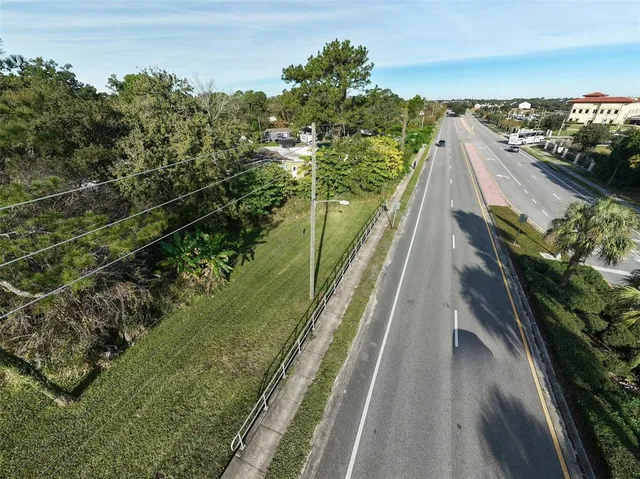 a view of a city with a yard