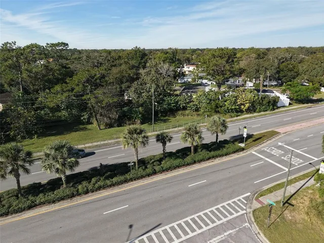 a view of swimming pool with a yard