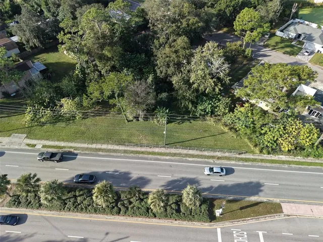a view of a garden from a balcony