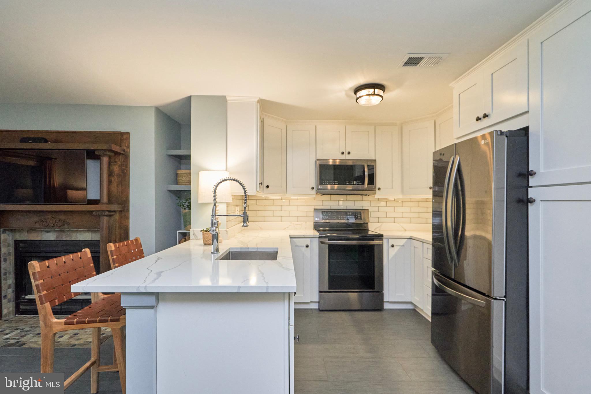 Renovated condo redone w/ beautiful white kitchen