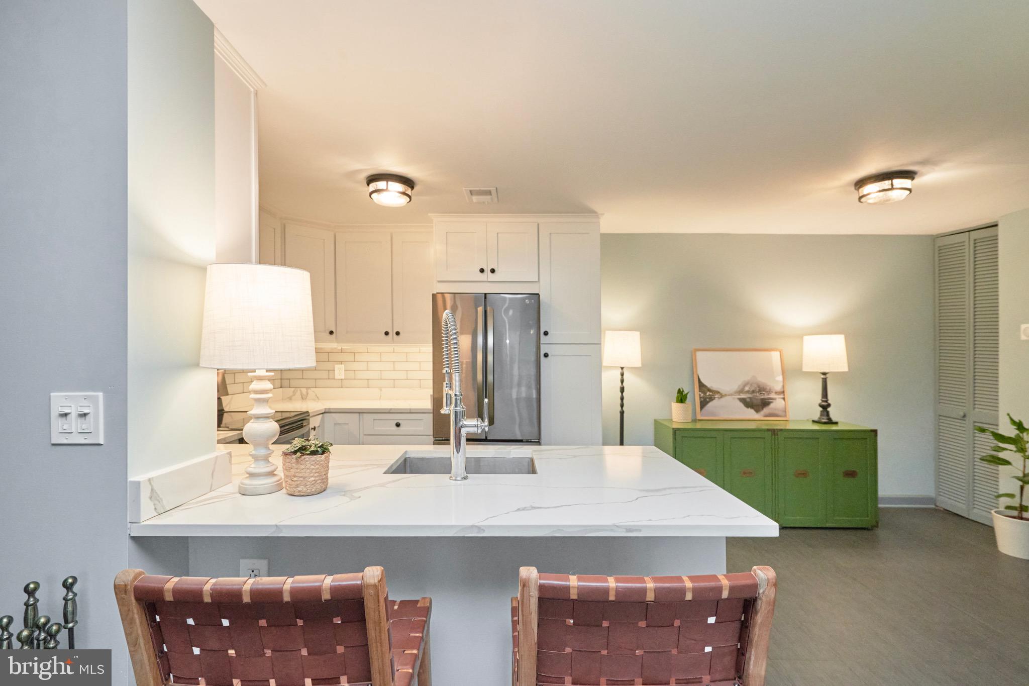 11703 Summerchase Circle Reston, VA 20194 - Photo 12 of 33 Counters with room for eating