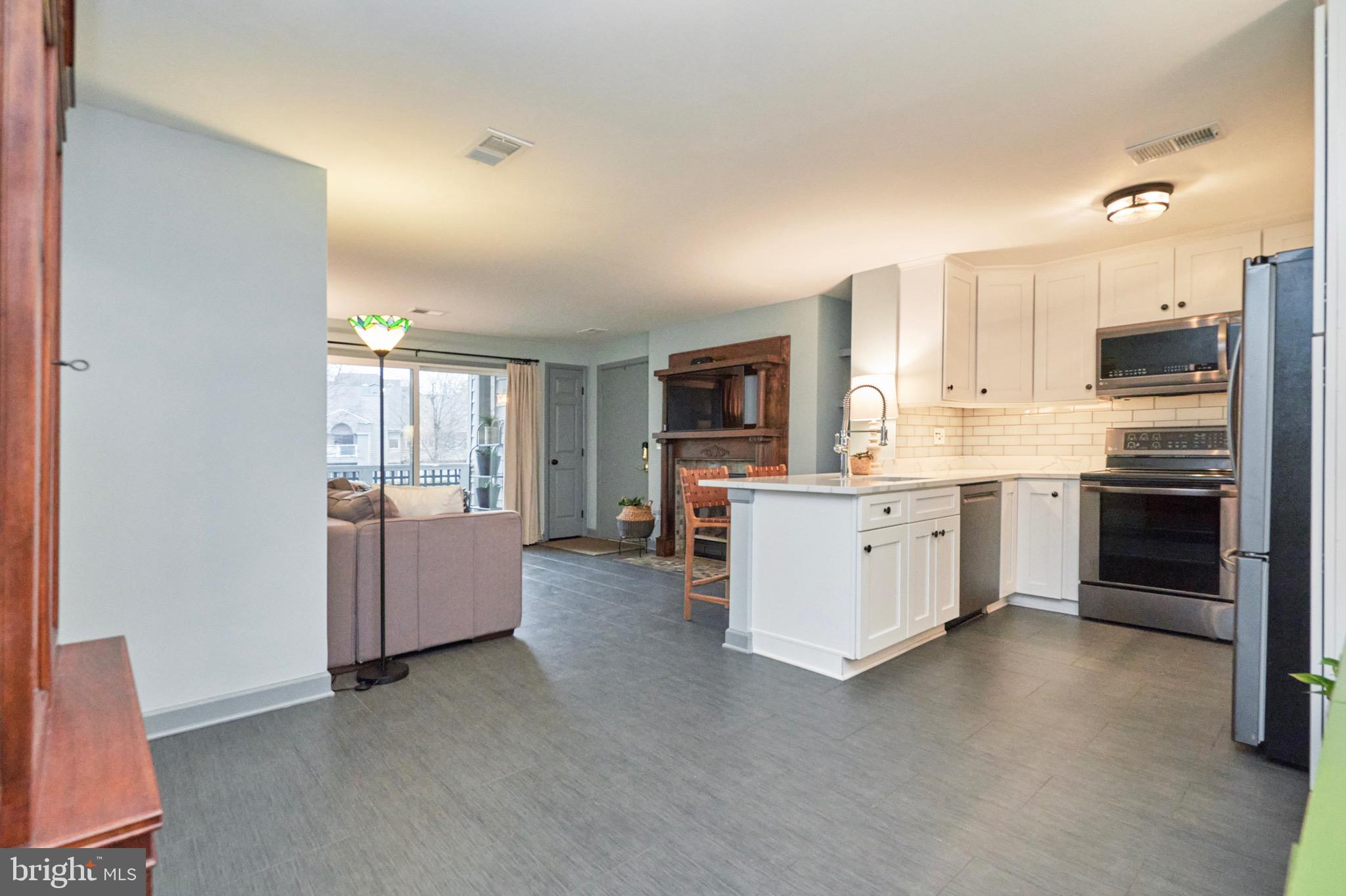 11703 Summerchase Circle Reston, VA 20194 - Photo 15 of 33 Popcorn ceilings removed in the LR, DR & Kitchen