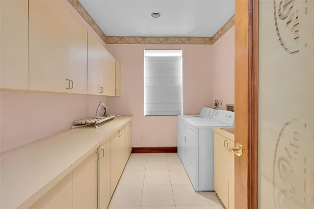 a room with gym equipment and a rug