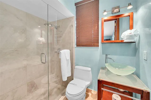 a view of swimming pool with chairs