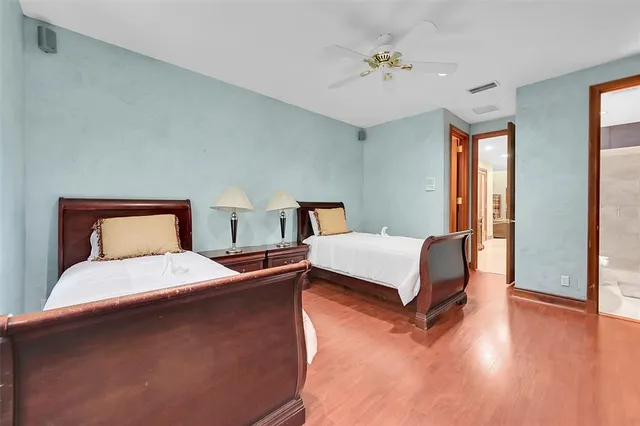 a view of a park with a palm trees