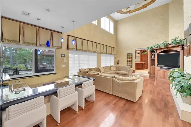 a view of a dining room with furniture and window