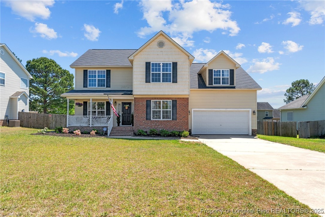 106 Polk Street Spring Lake, NC 28390 - Photo 1 of 47 a front view of a house with swimming pool