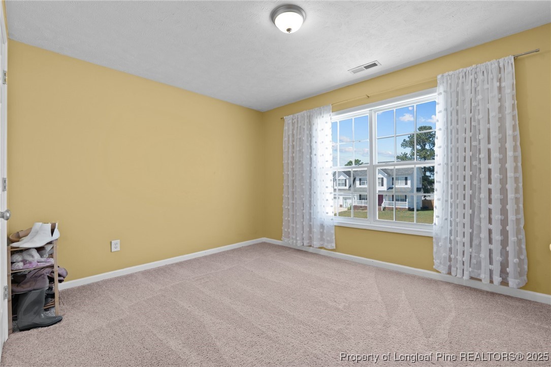 106 Polk Street Spring Lake, NC 28390 - Photo 29 of 47 a view of room with window and bathroom