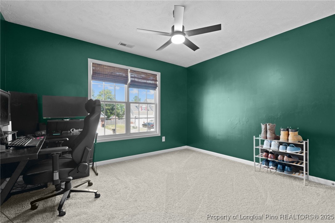 106 Polk Street Spring Lake, NC 28390 - Photo 34 of 47 a workspace with furniture and a window