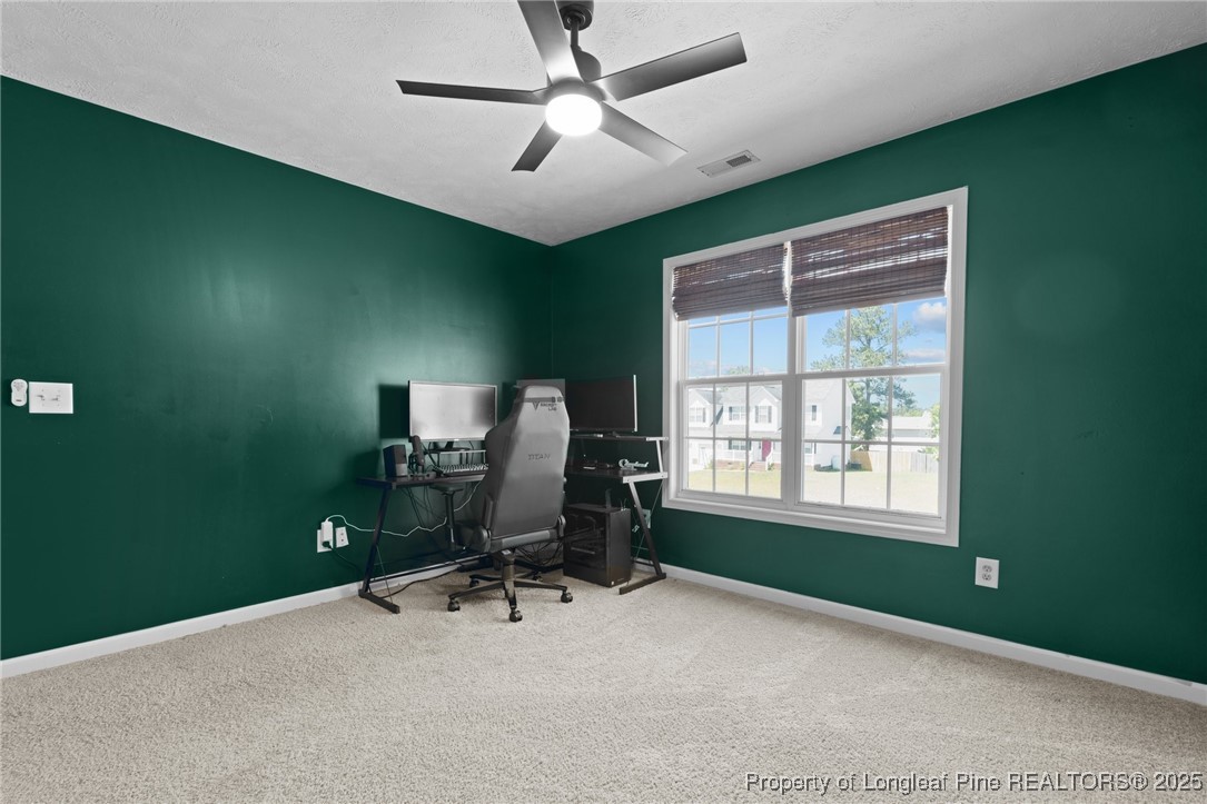 106 Polk Street Spring Lake, NC 28390 - Photo 35 of 47 a view of workspace with windows