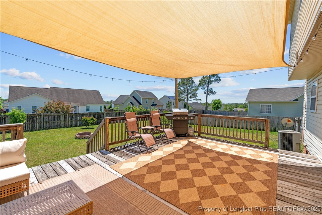 106 Polk Street Spring Lake, NC 28390 - Photo 43 of 47 a view of a patio with a yard