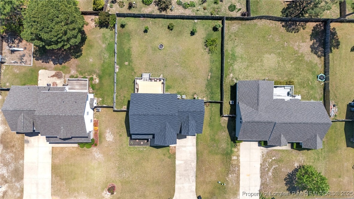 106 Polk Street Spring Lake, NC 28390 - Photo 47 of 47 an aerial view of residential houses with outdoor space