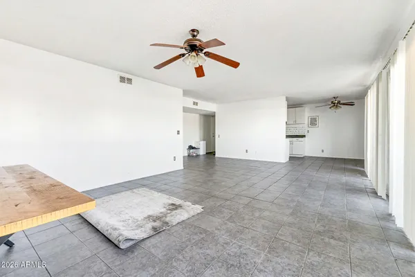 a view of an empty room and window
