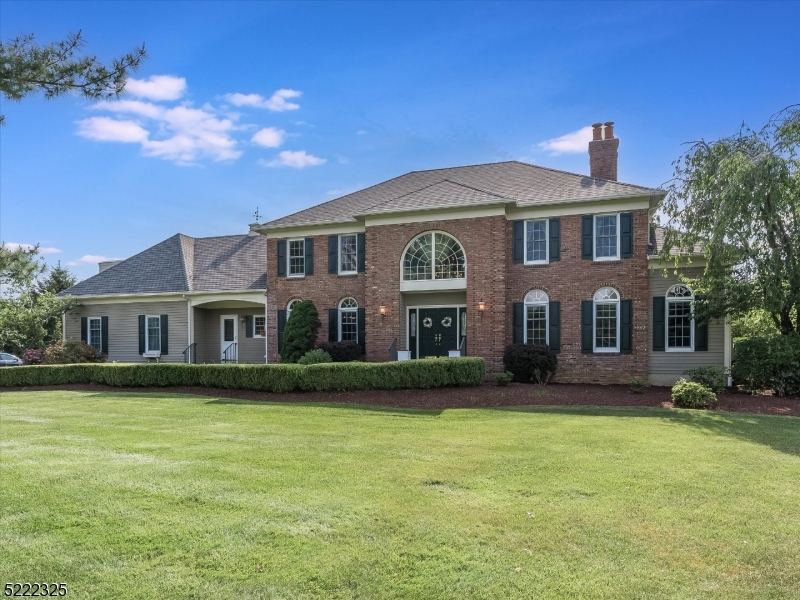 4 Ryan Court Chester, NJ 07930 - Photo 1 of 26 a front view of a house with garden