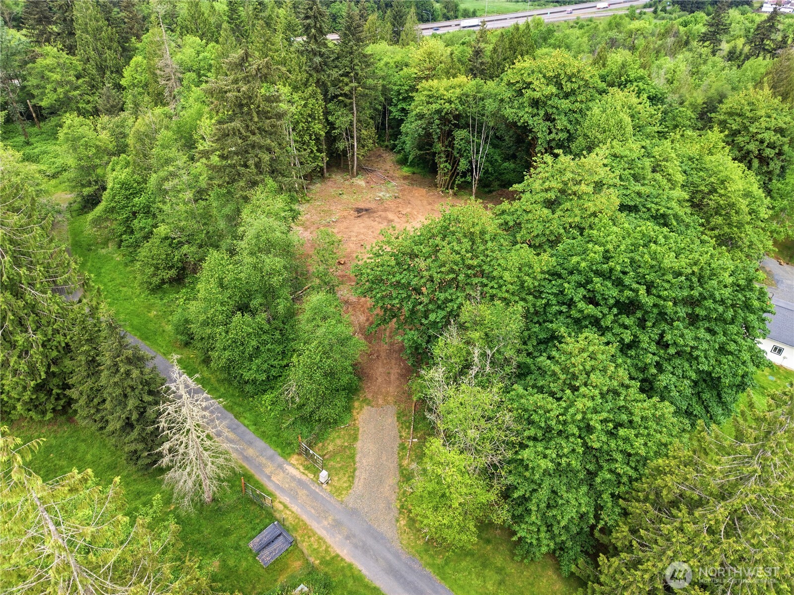 210 Vermillion Road Chehalis, WA 98532 - Photo 14 of 18 a view of a garden with a tree