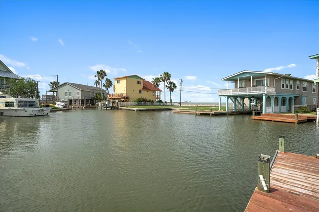 swimming pool view with a seating space