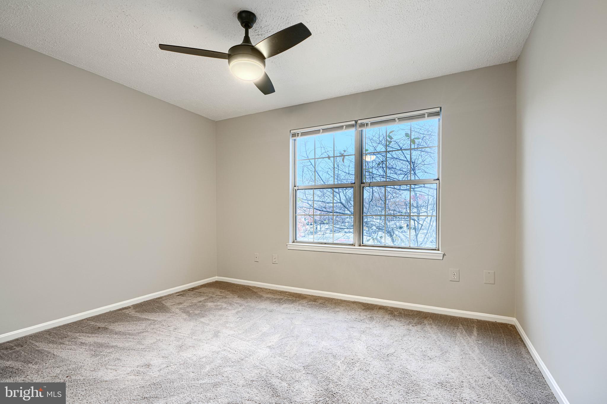 14905 Cleese Court, Unit 5AF Silver Spring, MD 20906 - Photo 21 of 30 an empty room with a window