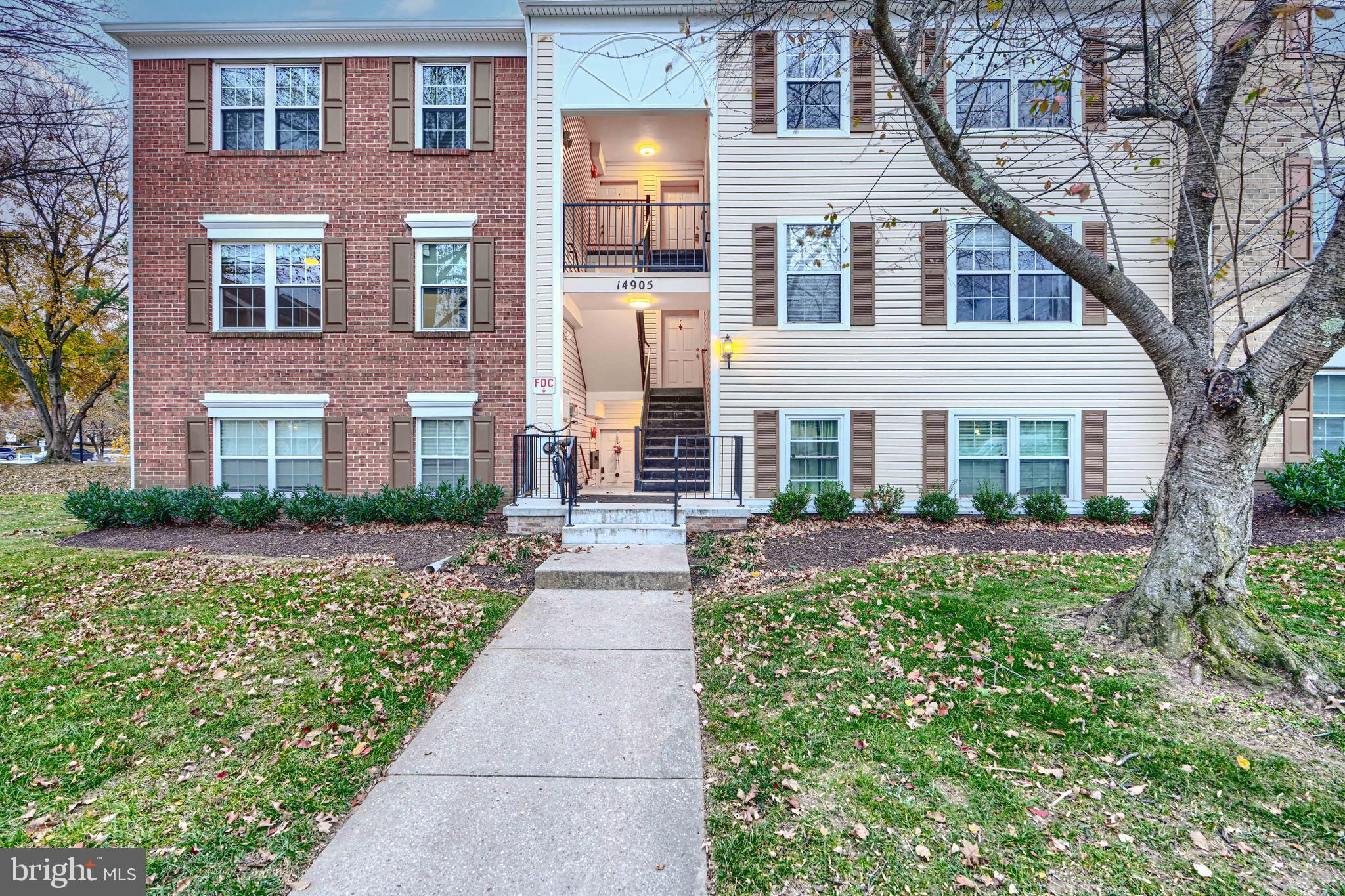 14905 Cleese Court, Unit 5AF Silver Spring, MD 20906 - Photo 26 of 30 front view of a brick house with a large windows