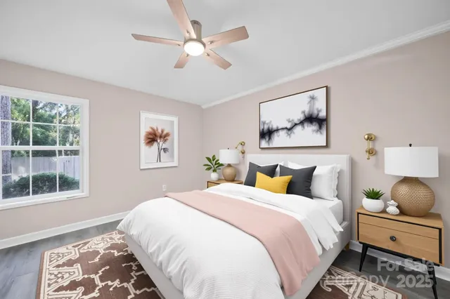 a bedroom with bed and window