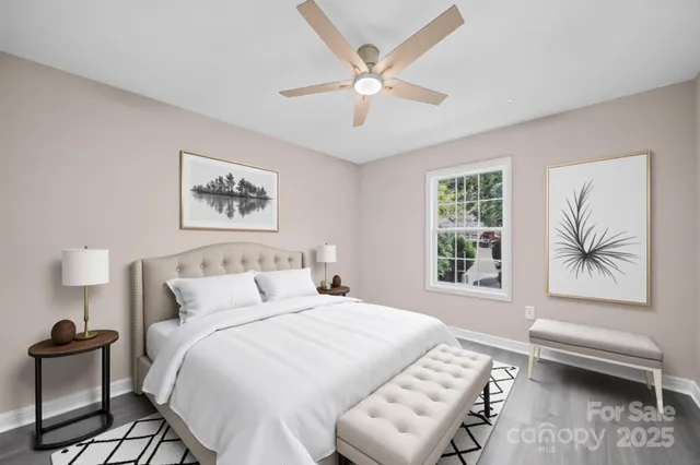 a bedroom with a bed and a couch