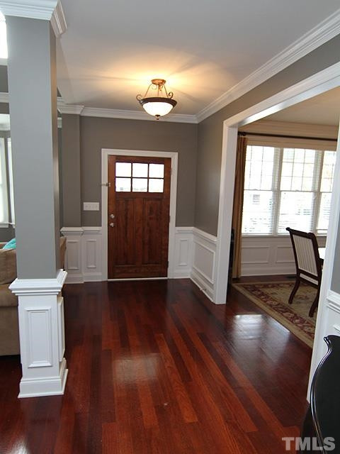 2225 Karns Place Raleigh, NC 27614 - Photo 3 of 23 As you pull up to this home you can see it has been well cared for, step onto your rocking chair front porch and enjoy the view, open the front door and this inviting foyer offers beautiful cherry hardwood floors, Formal Dr, spacious and open family room. foyer