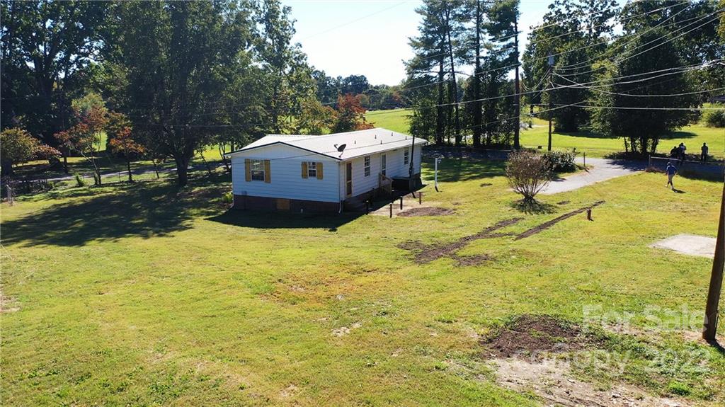 116 Circle Drive Fallston, NC 28090 - Photo 21 of 23 a view of a swimming pool with a yard and sitting area