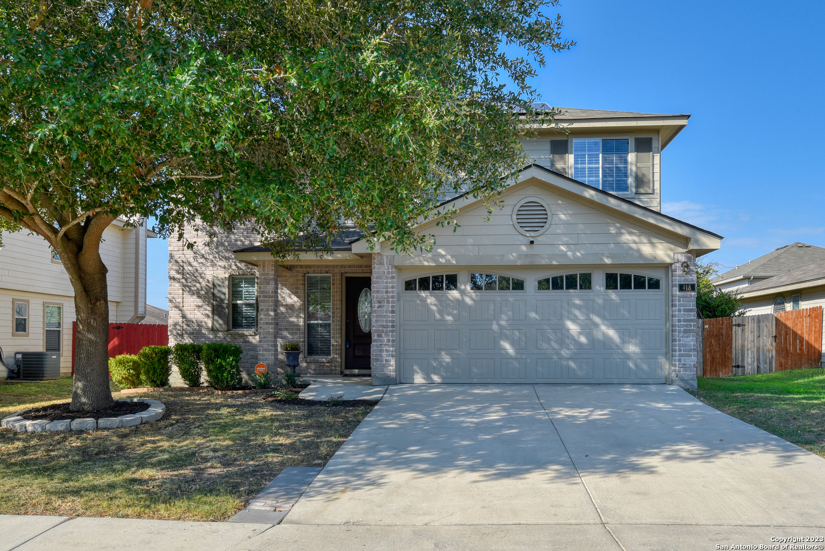 418 Abigail Converse, TX 78109 - Photo 1 of 1 a front view of a house with a yard
