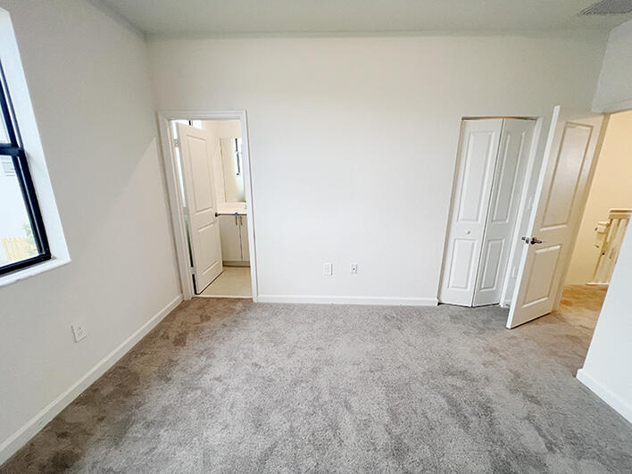 13302 Southwest 286th Street, Unit 13302 Homestead, FL 33033 - Photo 15 of 24 an empty room with windows