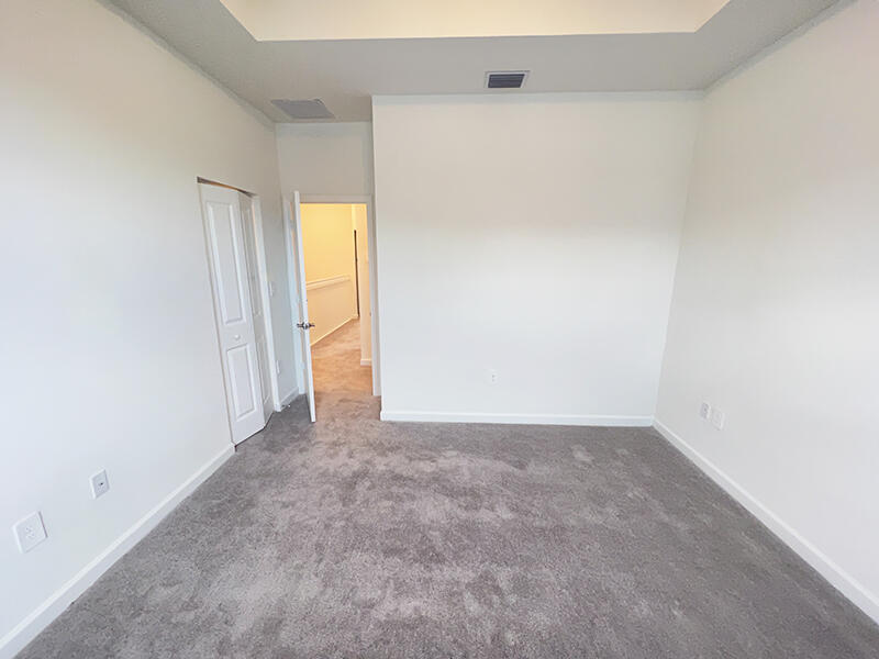 13302 Southwest 286th Street, Unit 13302 Homestead, FL 33033 - Photo 8 of 24 a view of an empty room with a window