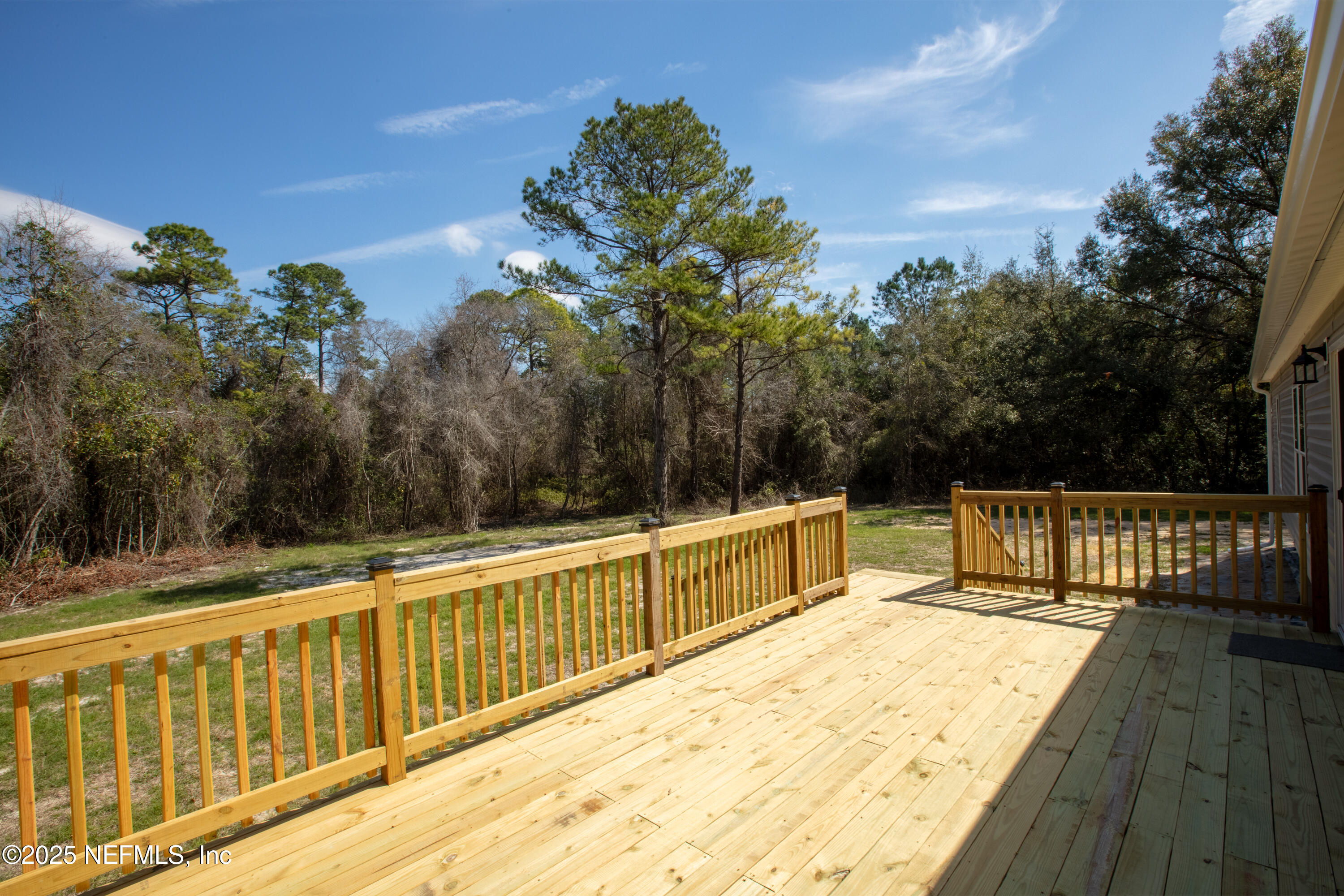 6012 Indian Trail Keystone Heights, FL 32656 - Photo 13 of 61 a view of balcony with wooden floor and fence