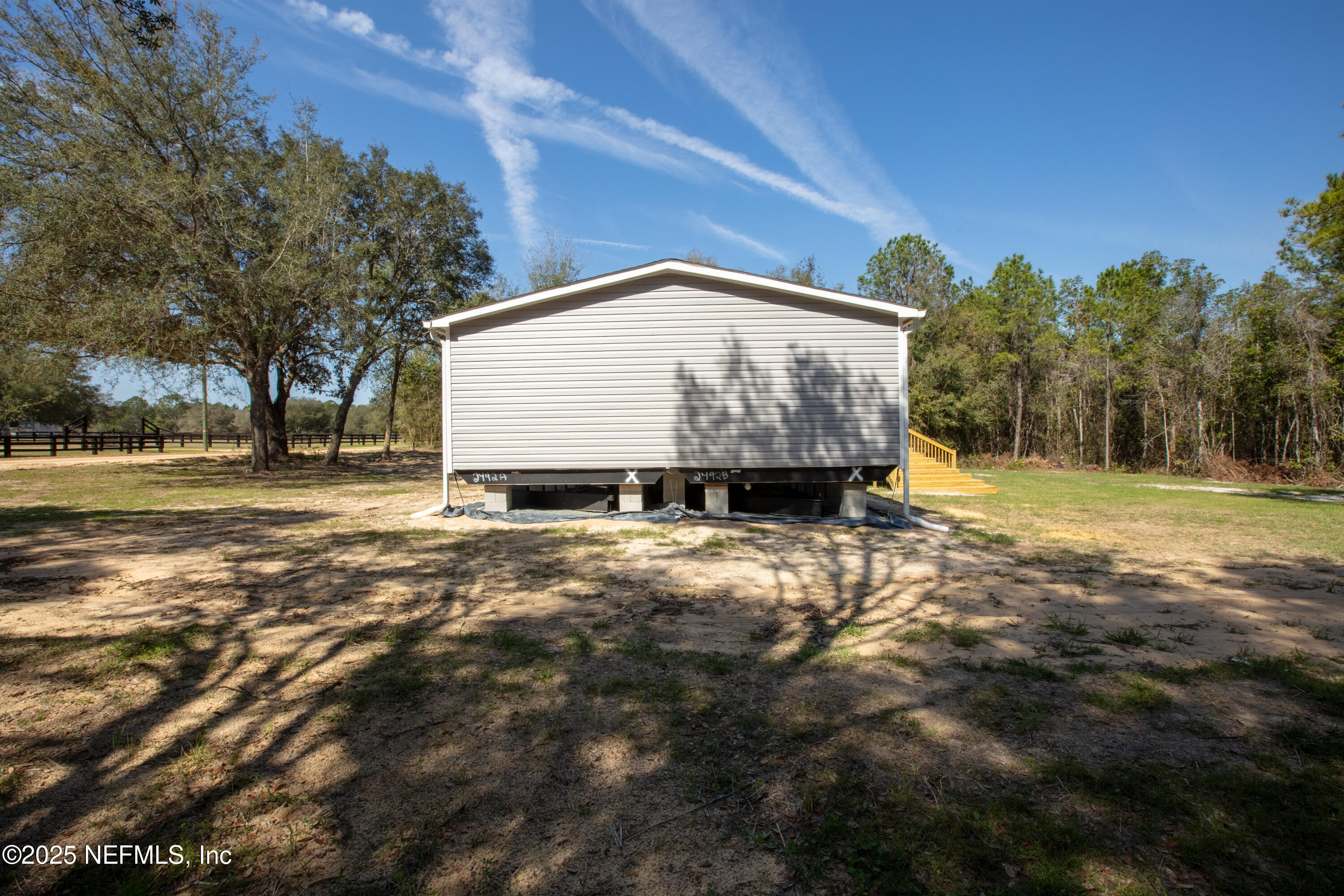 6012 Indian Trail Keystone Heights, FL 32656 - Photo 15 of 61 a sign board with big yard