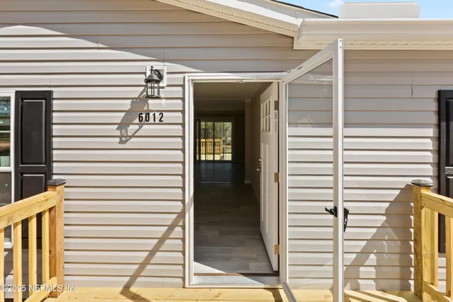 a view of a room that has a window in it