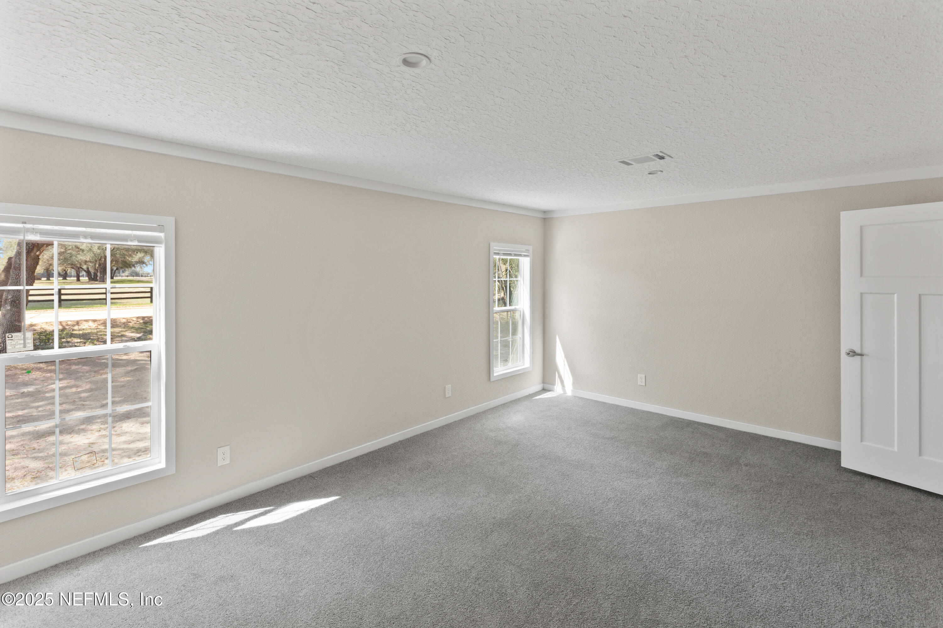 6012 Indian Trail Keystone Heights, FL 32656 - Photo 33 of 61 a view of an empty room with a window