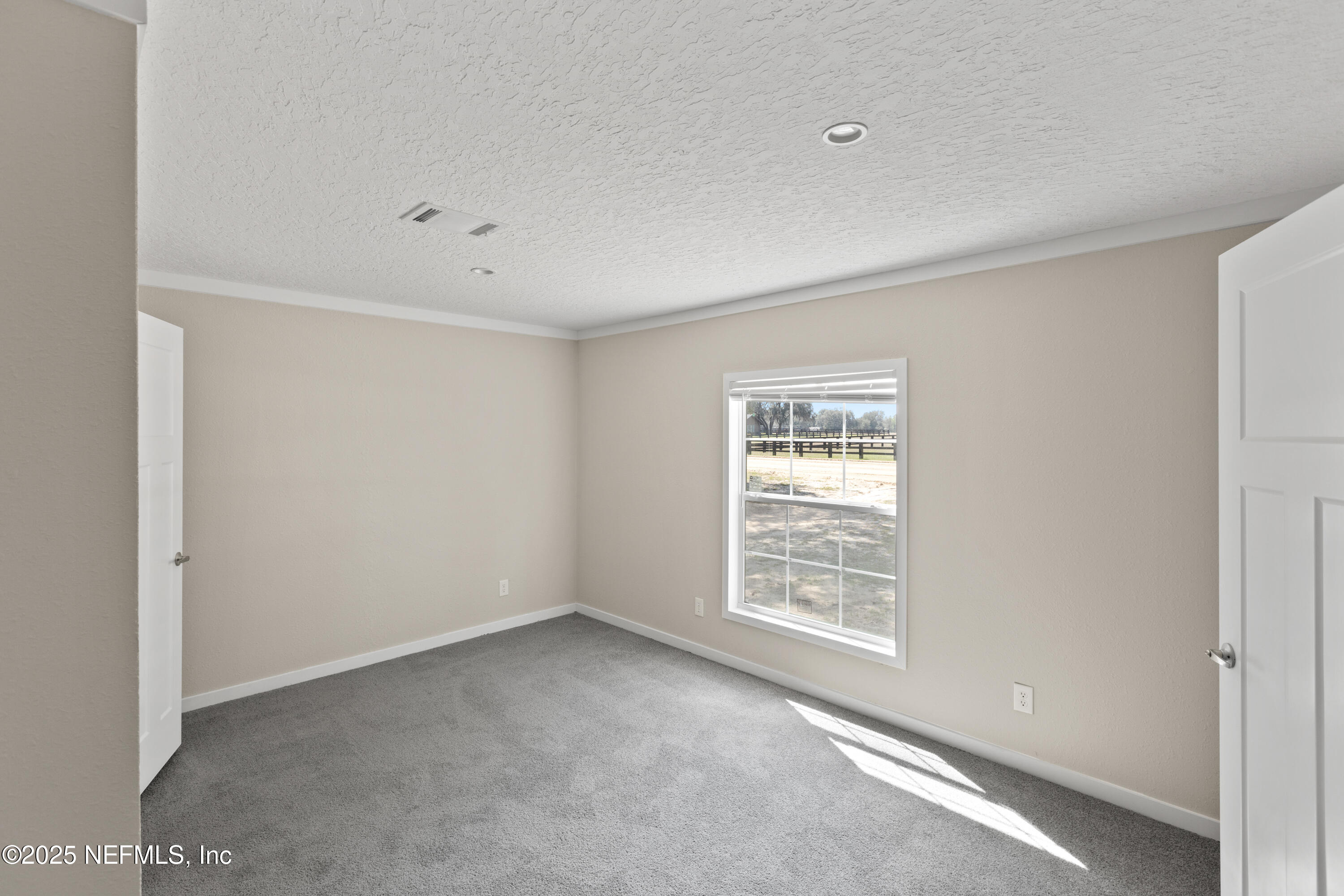 6012 Indian Trail Keystone Heights, FL 32656 - Photo 44 of 61 a view of an empty room with a window