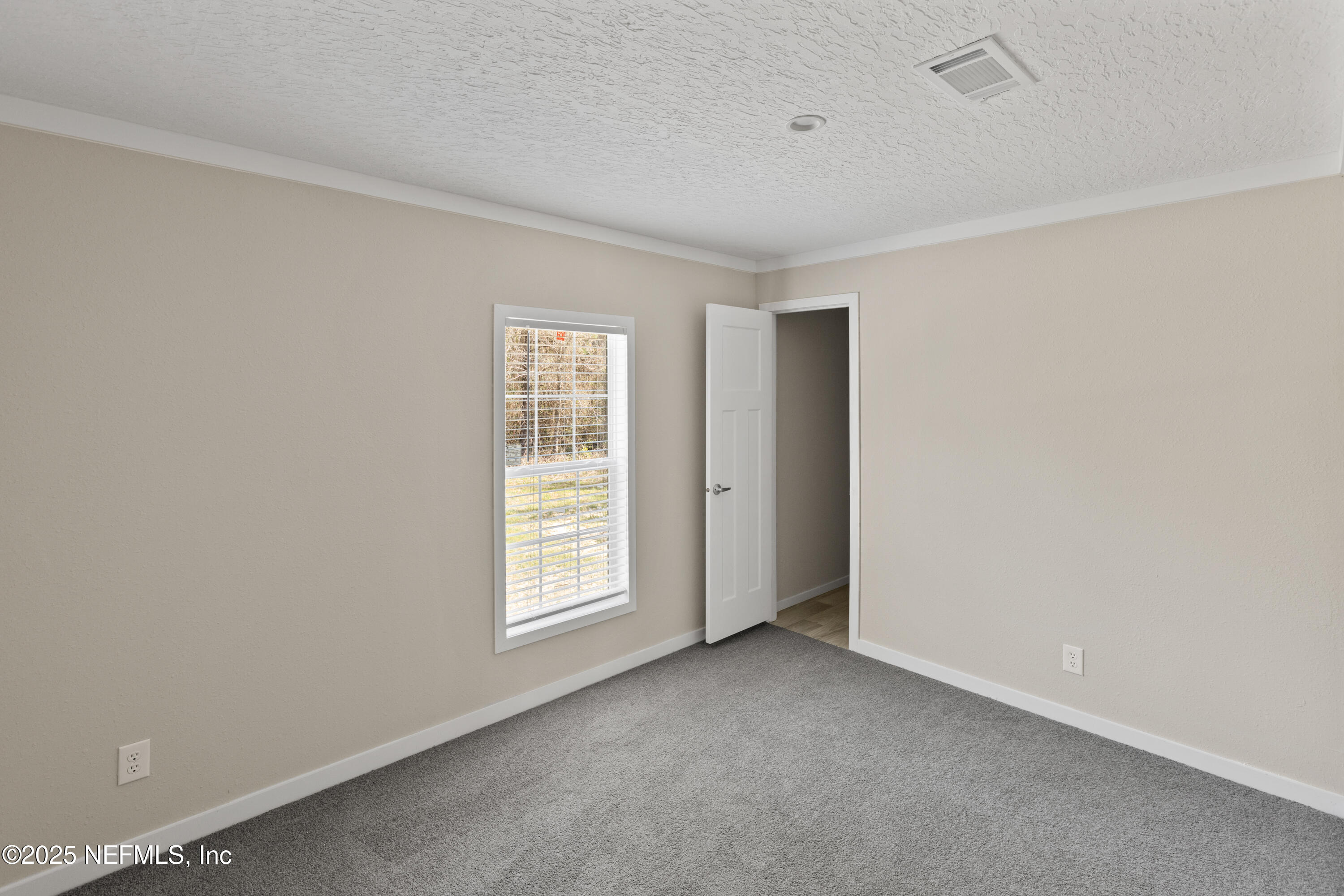 6012 Indian Trail Keystone Heights, FL 32656 - Photo 46 of 61 an empty room with windows