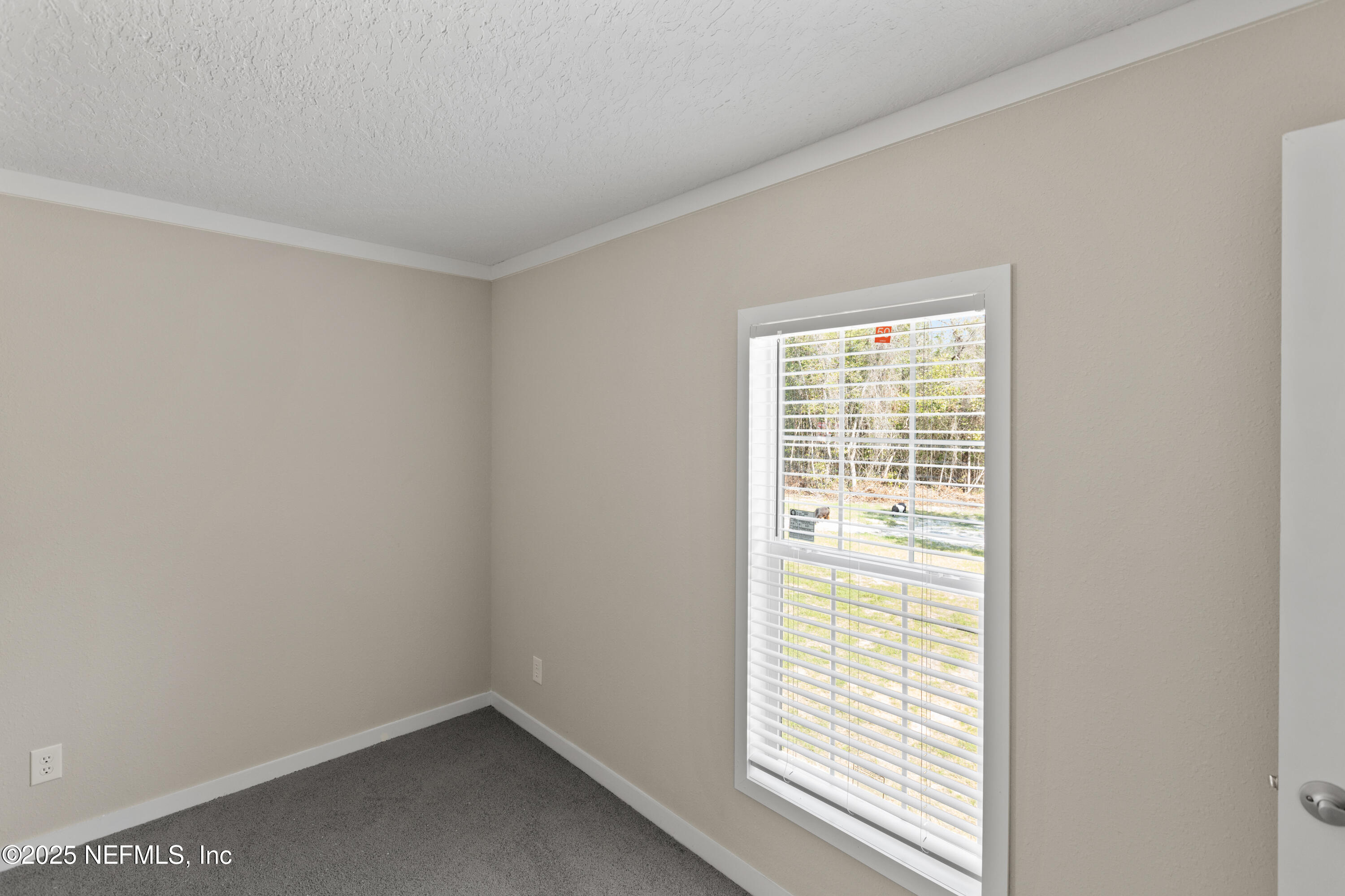6012 Indian Trail Keystone Heights, FL 32656 - Photo 47 of 61 a view of an empty room with a window