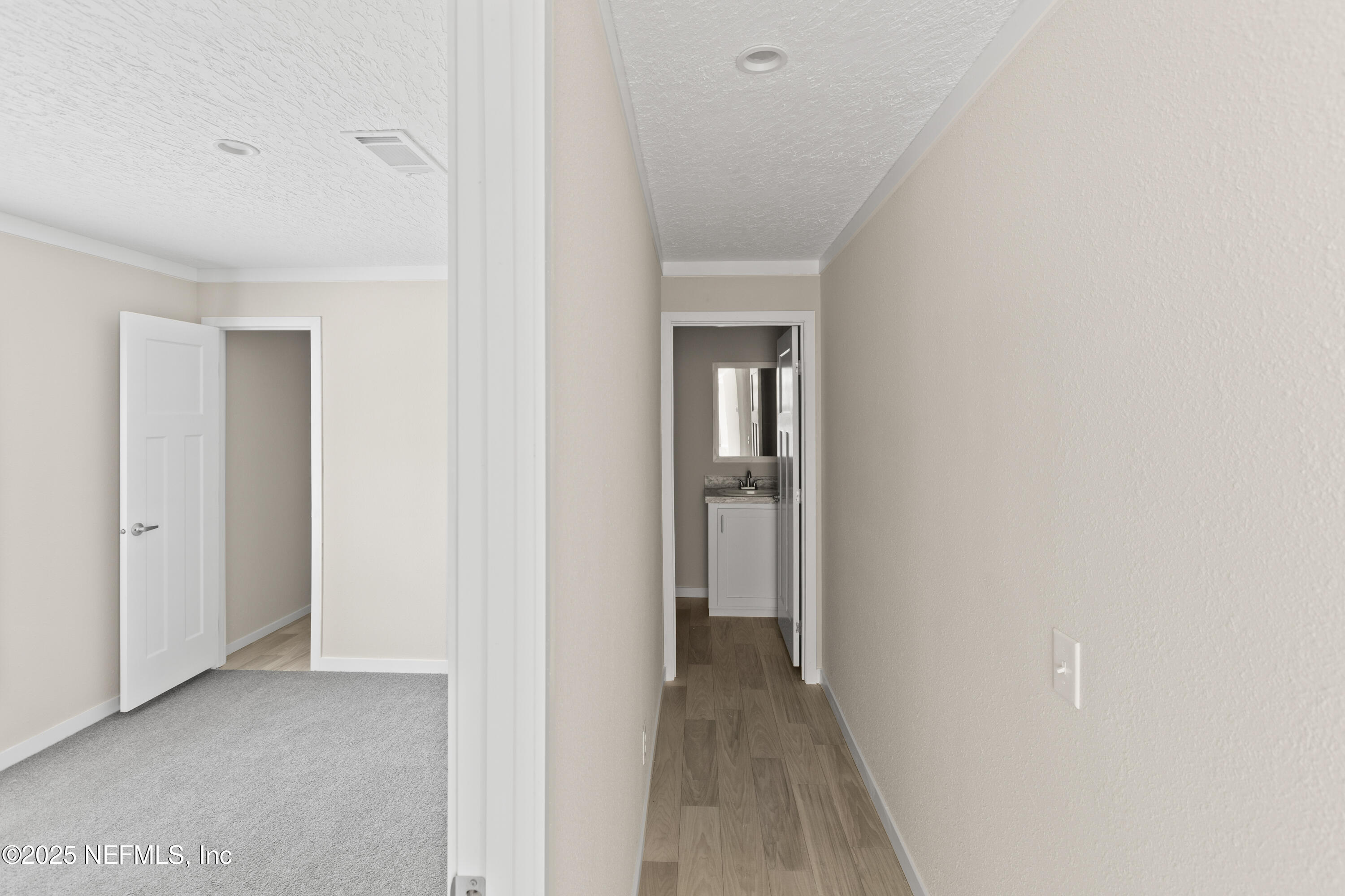 6012 Indian Trail Keystone Heights, FL 32656 - Photo 49 of 61 a view of a room with wooden floor