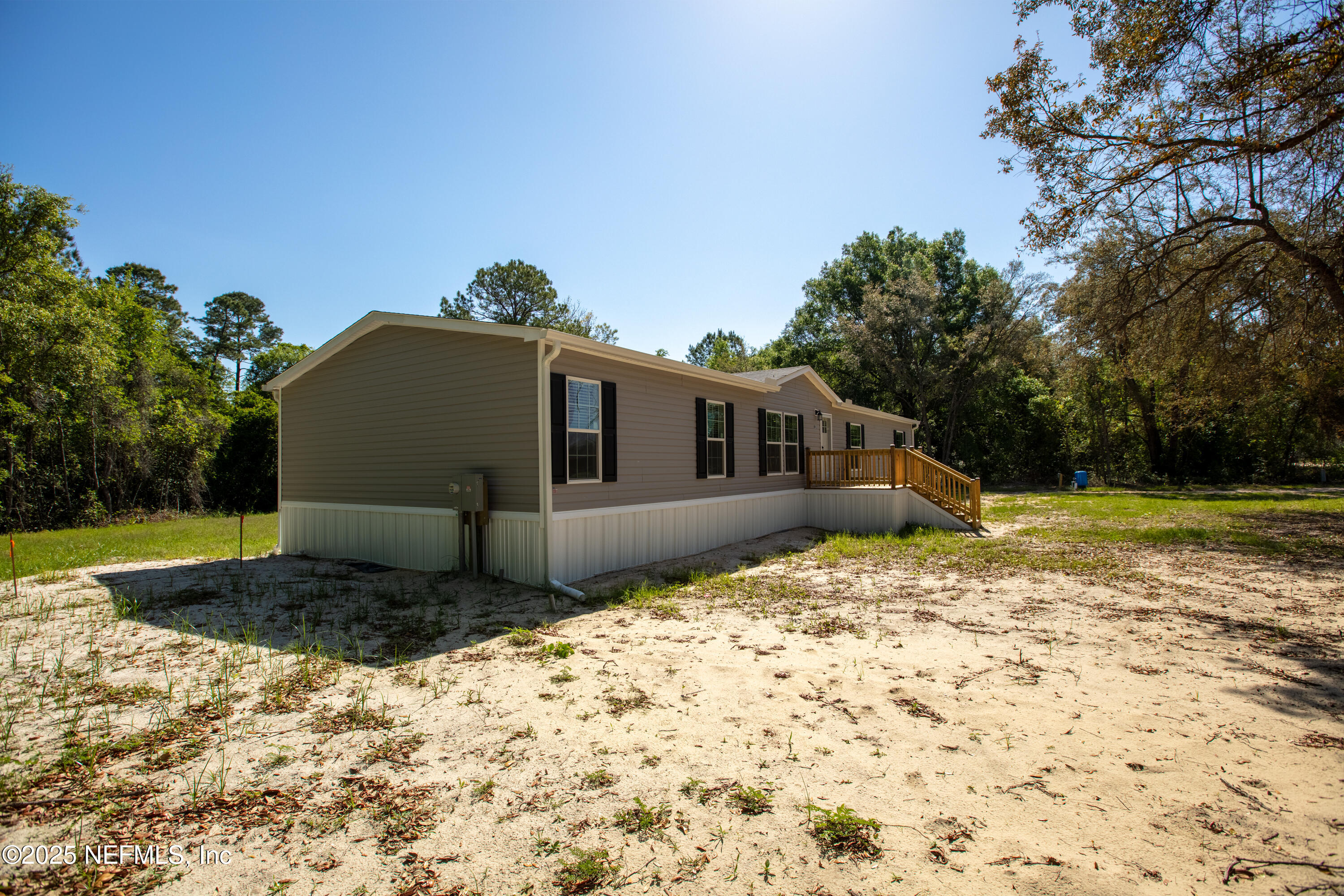 6012 Indian Trail Keystone Heights, FL 32656 - Photo 5 of 61 a house view with a outdoor space