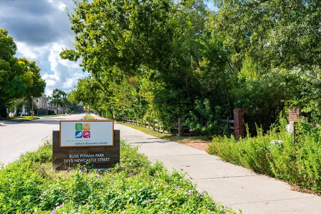 a view of street with parked cars