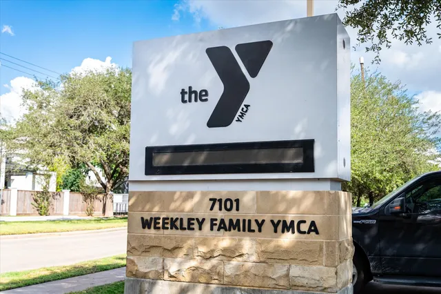 a sign that is on the wall of building