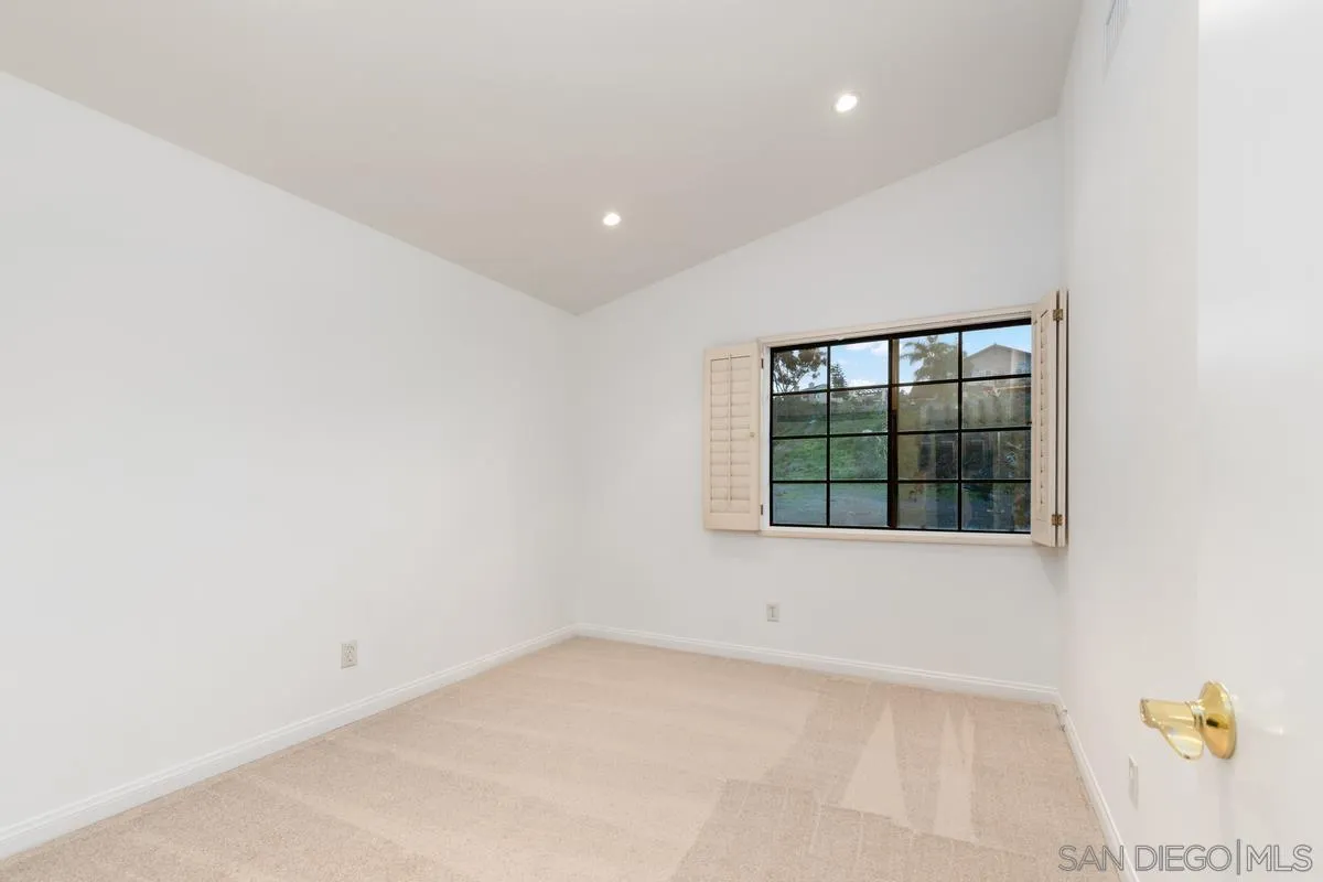 445 Via Savoy Encinitas, CA 92024 - Photo 21 of 39 an empty room with a window