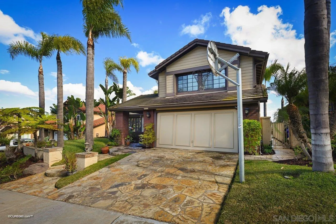 445 Via Savoy Encinitas, CA 92024 - Photo 38 of 39 a front view of a house with a garden