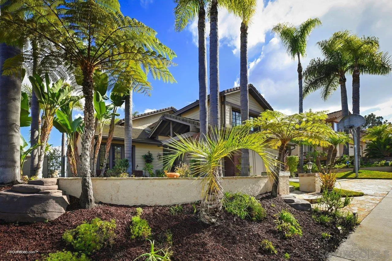 445 Via Savoy Encinitas, CA 92024 - Photo 39 of 39 a view of a house with a yard and palm trees